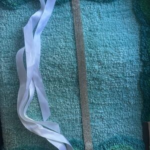 Diamond tie-on belt embellishment